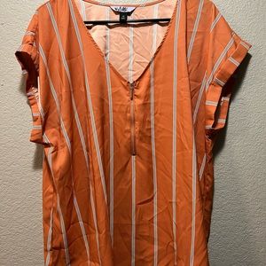 Orange zip up blouse